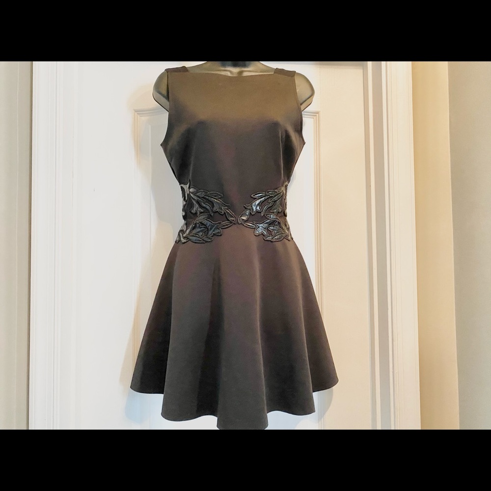 Don’t miss this classy mini black dress!